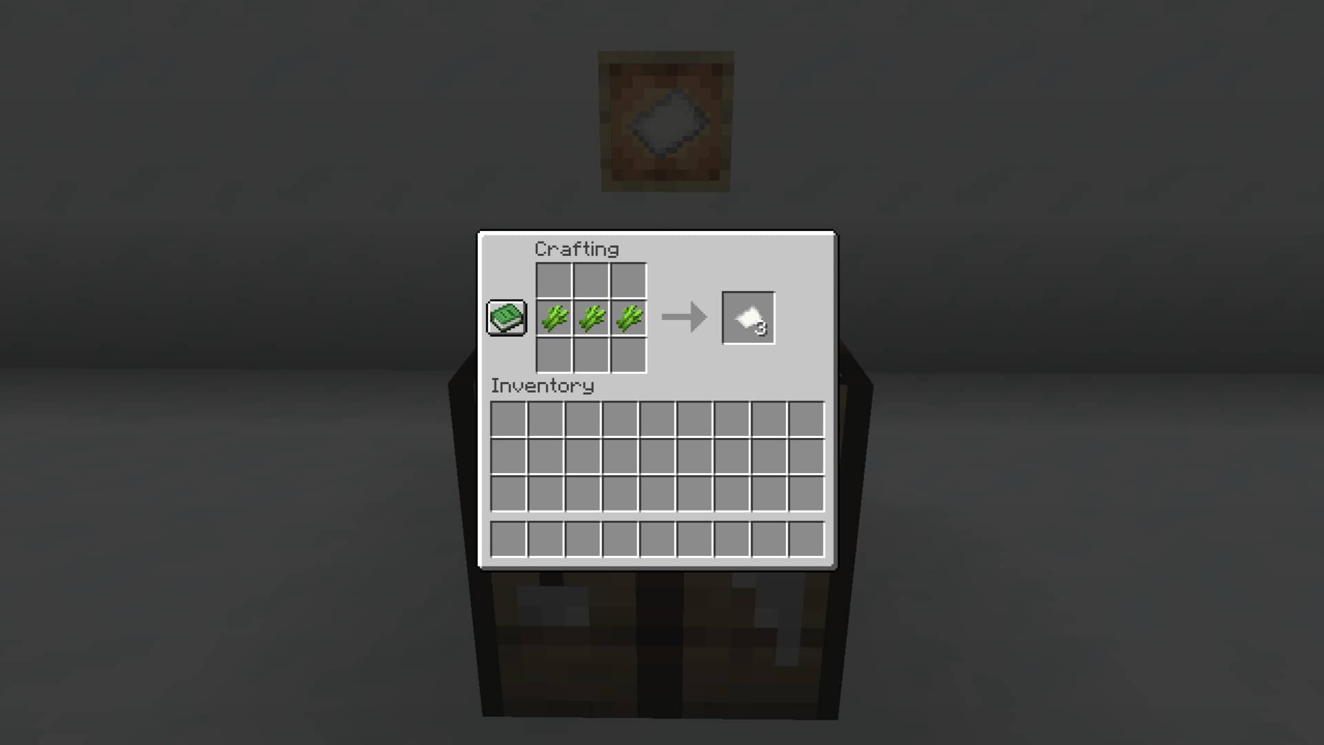 The paper craft recipe in a crafting table